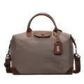 Large waterproof travel duffel bag with top handles and leather trim for weekend trips. - Khaki