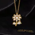 Detailaufnahme der funkelnden Zirkonia Sonnenblumen Kette, elegantes vergoldetes Design. - Premium Luxus Kleine Gänseblümchen (C)