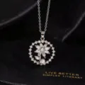 Primer plano detallado de un collar con colgante de girasol de circonita brillante. - Estilo Fino Plateado Perla Artificial Adornada (N)