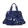 Grand sac à bandoulière étanche en tissu oxford pour femme avec imprimé galaxie. - Bleu