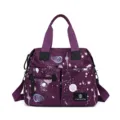 Sac à langer violet multifonctionnel à imprimé espace, grande capacité, cabas et bandoulière. - Violet
