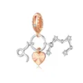 Detailed view of silver and rose gold zodiac charm with sparkling cubic zirconia stones. - Taurus Style (CYT073-4)