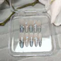 Primer plano de uñas postizas ovaladas largas con degradado ojo de gato, serpiente y corazones. - XS [Talla muy pequeña] / 10 Piezas / GSMZ846-B5 Secreto de Serpiente Azul (Pegamento de Gelatina)