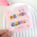 Detailed view of children press on nail set featuring cute cartoon relief designs with twelve pieces. - Sweet Fairytale (KET115-G) / 12-Piece Set