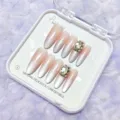 Detalle de uñas postizas press-on degradado rosa nude efecto ojo de gato con brillantes pedrería - XS / Caja de Plástico Con Juego de Herramientas de 5 Piezas / Rosa nude