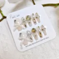Uñas postizas largas con lazo de diamantes de lujo estilo elegante variante 10 pzas - S / Diseño de Moño de Lujo / Paquete de Tarjeta Estilo Pegamento de Gelatina