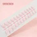 Detalle de uñas postizas rosas lisas, largas y cuadradas europeas, sin pintar en soporte. - Rosa Raíz de Loto (TJP2145-Y543-W) / Paquete de 24 Piezas en Tira