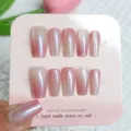 Handmade press-on nails detail showing pink cat eye crystal gradient nail art pieces. - XS (Extra Small) / Peach Ice Brew (Card Packaging Jelly Glue)