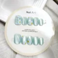 Uñas postizas hechas a mano con efecto ojo de gato y bonito diseño de margarita blanca. - Margarita Pequeña Ojo De Gato