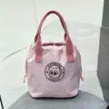 Waterproof pink canvas bucket lunch bag with cute bear logo print for daily commuting - Pink