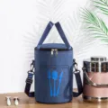 Ronde geïsoleerde lunchtas met schouderband, waterdichte bento tas voor dagelijkse maaltijden. - M / Donkerblauw