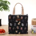 Leuke canvas lunchtas voor dames, Japanse stijl bento tas met kattendruk en stevige handvatten. - Zwarte veel katten