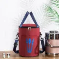 Red round insulated lunch bag with blue handles and fork icon for daily meal prep use. - M / Red