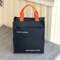 Zwarte totebag met oranje handvatten, meerlagige documententas en studentenhandtas. - 808 Zwarte letters