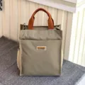 Multi-layer thickened canvas tote bag with brown handles and mesh side pockets for daily commute. - 808 Khaki Tag