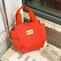 Oranje canvas shopper tas, grote lunchhandtas met stevige handgrepen en zakken. - Oranje