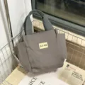 Donkergrijze canvas lunchtas, minimalistische handtas voor dagelijks gebruik casual stijl. - Grijs