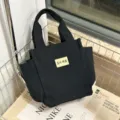 Black canvas tote bag, casual handbag, durable lunch box bag, minimalist daily mommy bag. - Black