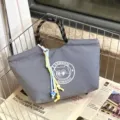 Grey waterproof lunch bag with rope handle and cute charm for daily commute and work. - Gray