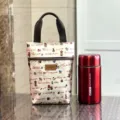 Waterdichte canvas handtas en rode thermosfles set met schattige cartoonprints voor dagelijks gebruik. - 9589 beige muzieknoot meisje