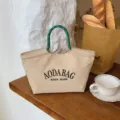 Minimalistiki tsanta kamba gia gynikes, megali casual tsanta cheiros me prasines labes schinioy. - S / 768 Μικρό χακί