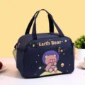 Dark blue insulated lunch bag featuring a cute cartoon bear print, waterproof bento box tote. - Navy Blue Planet Bear