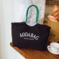 Minimalistische zwarte canvas tote tas met groene touwhandvatten, grote dagelijkse forenstas. - 769 Groot zwart