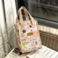 Waterproof insulated lunch bag with cute bear print, durable canvas tote for work and school. - Fries Bear