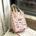 Waterproof insulated lunch bag with cute bunny pattern, portable bento bag for office workers. - Pink Bunny Ears