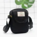 Borsa a tracolla in nylon nero da donna, piccola borsa casual con tracolla regolabile. - nero classico