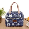 Canvas lunch bag for women, cute cat print insulated tote handbag with sturdy pink handles. - Blue Cat Motif