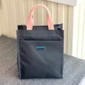Multi-layer thick canvas tote bag for students and commuting, dark grey with pink handle. - 808 Grey Tag