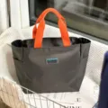 Oxford cloth lunch tote bag in dark grey with orange handles, stylish large capacity commuter bag. - Large Gray Patch Style