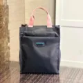 Black multi-layer thickened tote bag with pink handles, perfect for student commuting and storage. - 808 Grey Tag