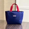 Blaues Oxford-Stoff Lunchpaket, minimalistische Farblock Tragetasche für Büro und Pendler. - S / Etikettenschild / Blau