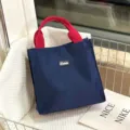 Grote colorblock canvas lunchtas, stijlvolle handtas voor kantoor en dagelijks gebruik. - Blauw