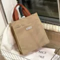 Grote kleurrijke lunchtas met stevige handvatten en ritsvak voor dagelijks werk of school. - Khaki
