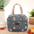 Insulated lunch bag with cute cat print, durable grey canvas tote for daily work and school use. - Blue Cat Eating Fish