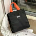 Grote kleurenblok tote lunchtas, zwarte en oranje draagbare bentotas voor kantoor en school. - Zwart