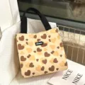 Canvas lunch tote bag with cute heart pattern and sturdy black handles for daily use. - Khaki Heart
