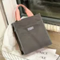 Dark grey lunch bag with pink handles, large portable bento tote bag for work and school. - Gray