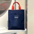 Large color-block dark blue lunch bag with red handles, portable bento tote for daily use. - With Cup Holder / Blue