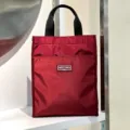 Red nylon lunch tote bag with black handles, stylish casual handbag for school and work. - With Cup Holder / Burgundy