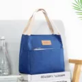 Ανθεκτική αδιάβροχη μπλε τσάντα φαγητού bento με μπεζ χερούλια για σχολείο και εργασία. - Denim Μπλε