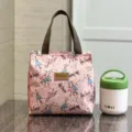 Kleine cartoon geprinte lunchtas, waterdichte thermische handtas voor studenten en pendelaars. - 9494 roze schoonheid