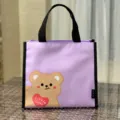Cute purple insulated lunch bag with cartoon bear print, portable bento bag for office or school. - Purple Bear
