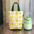 Canvas beker tas met leuke smiley print, duurzame handtas voor dagelijks werk en snacks. - Beige Smiley
