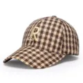 Closeup of the thick plaid baseball cap featuring unique 3D embroidered letter R detail. - Adjustable / Coffee