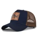 Gorra de camionero azul marino con parte trasera de malla marrón y parche de cuero de tiburón. - Ajustable / Marino y Malla Café