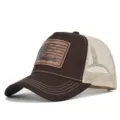 Close-up detail of the brown and beige mesh baseball hat with hunting leather patch. - Adjustable / CM816-40 Coffee Beige Mesh